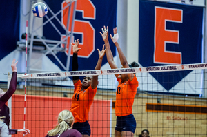 Jalissa Trotter (14) was a bright spot for Syracuse's struggling team. She had the second most blocks on the team and the second highest hitting percentage.